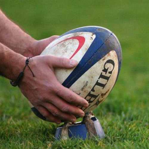 Ballon-rugby : Ballon de rugby lors d'un match illustrant la prestation de relations publiques par Toul'events