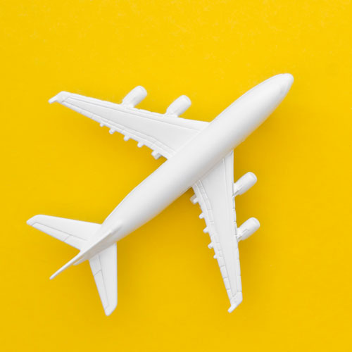 Voyage-entreprise : avion blanc illustrant l'organisation de voyage d'entreprise par Toul'events